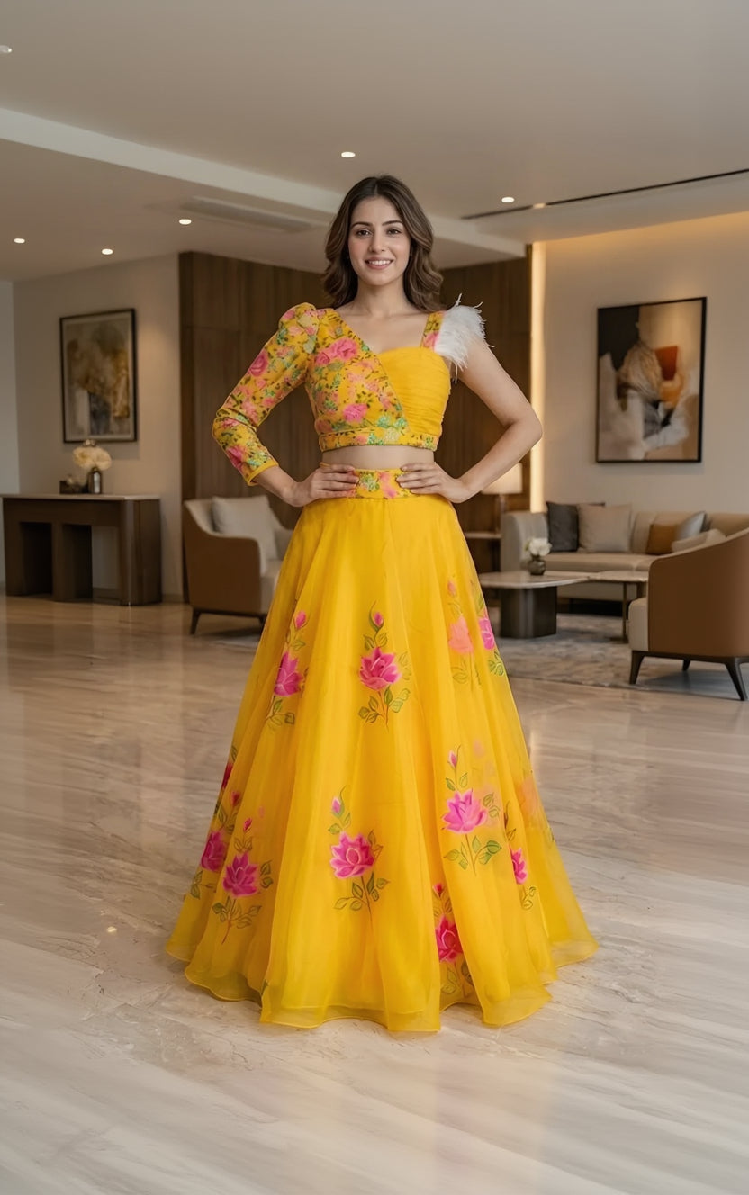 Woman in a yellow floral outfit standing in an indoor setting