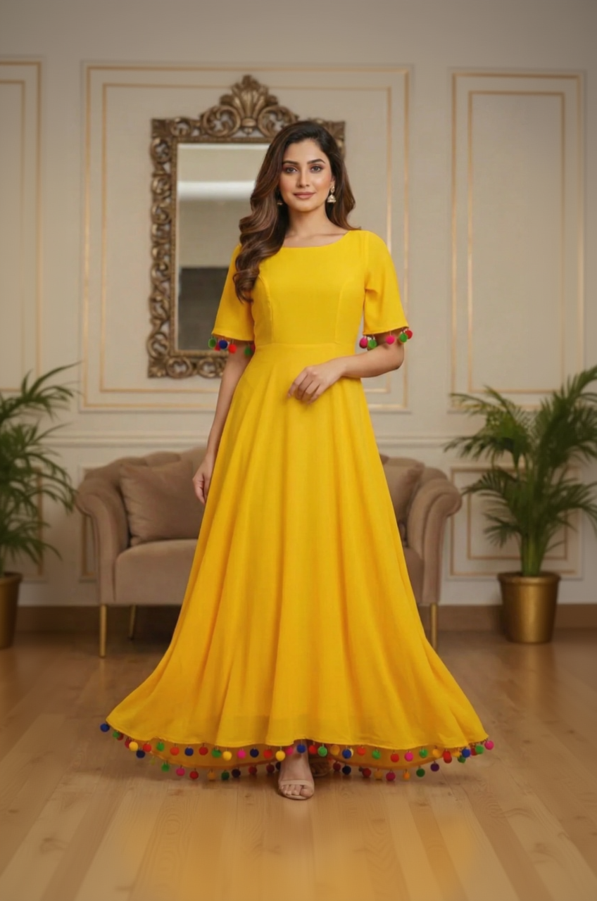 Woman wearing a yellow dress with colorful pom-poms in an elegant room.