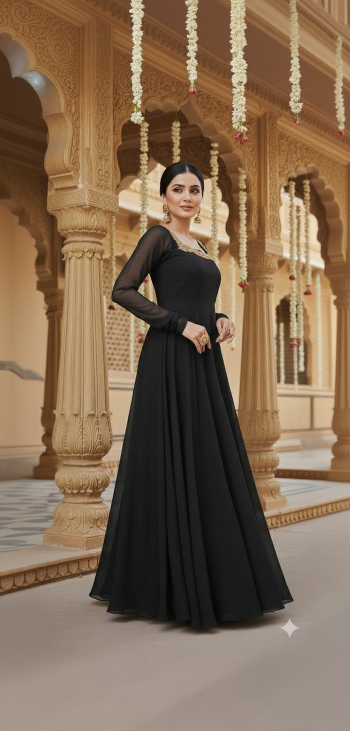 Woman in a black dress standing in an ornate architectural setting
